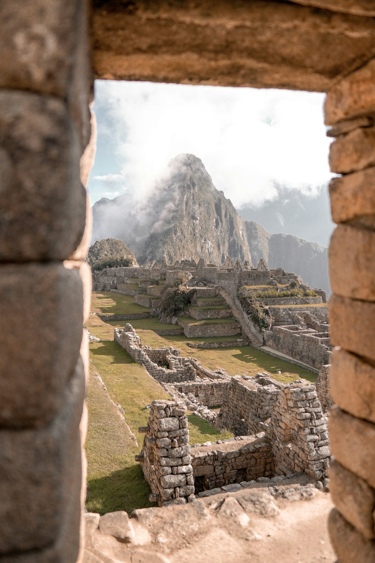 Machu Picchu through a stone window