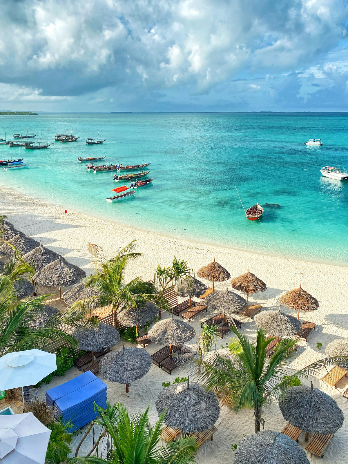 Wooden boats in turquoise water, Zanzibar