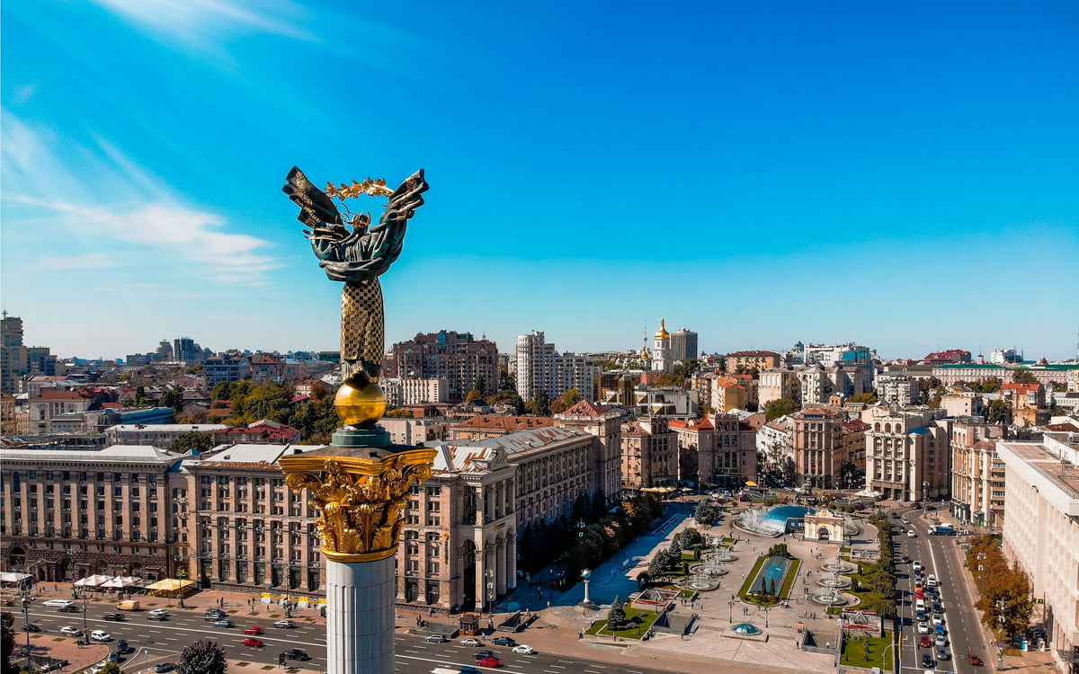 Kyiv cityscape with a monument