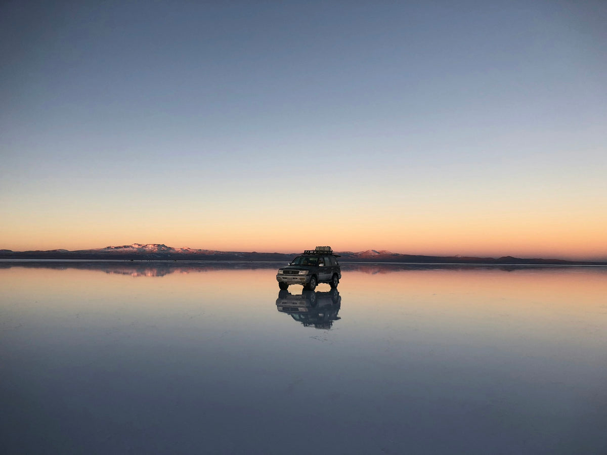 4x4 on the flooded salt flat, Bolivia