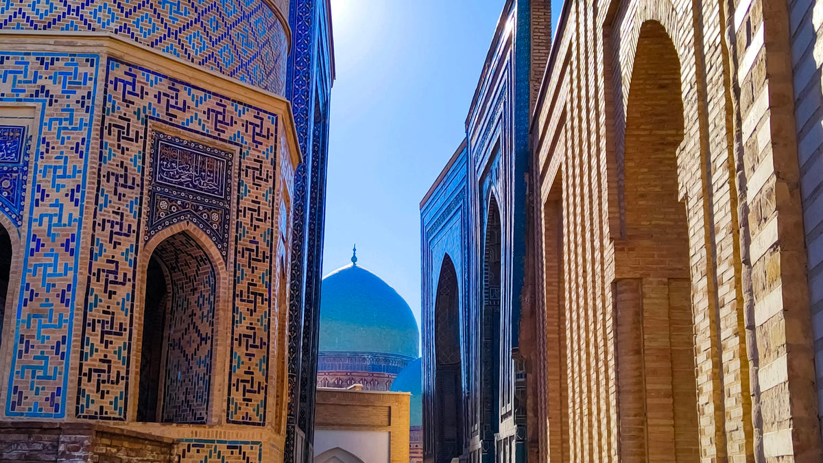 Old town alley with a blue dome, Uzbekistan